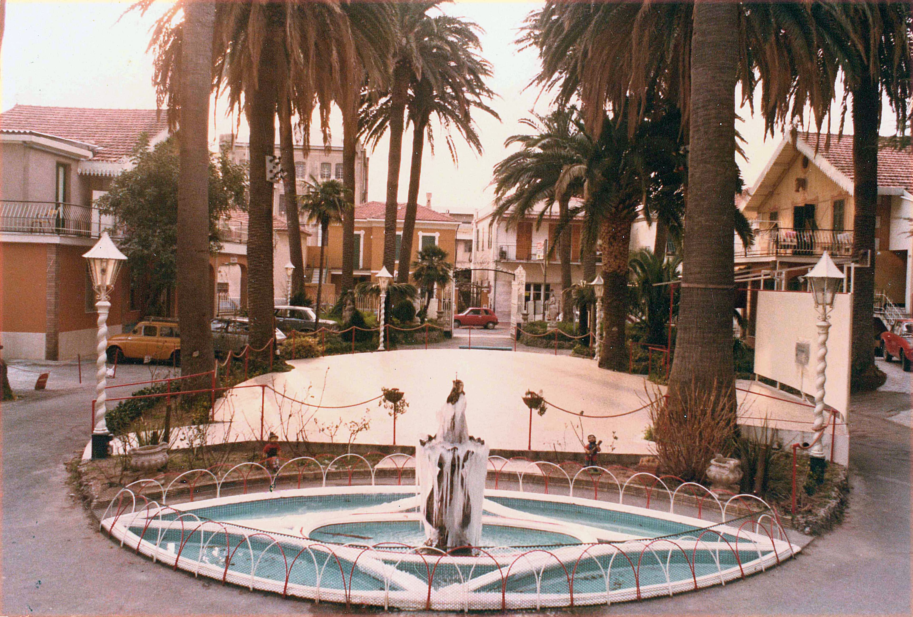 Park Hotel courtyard with palm trees and decorative fountain, Pietra Ligure