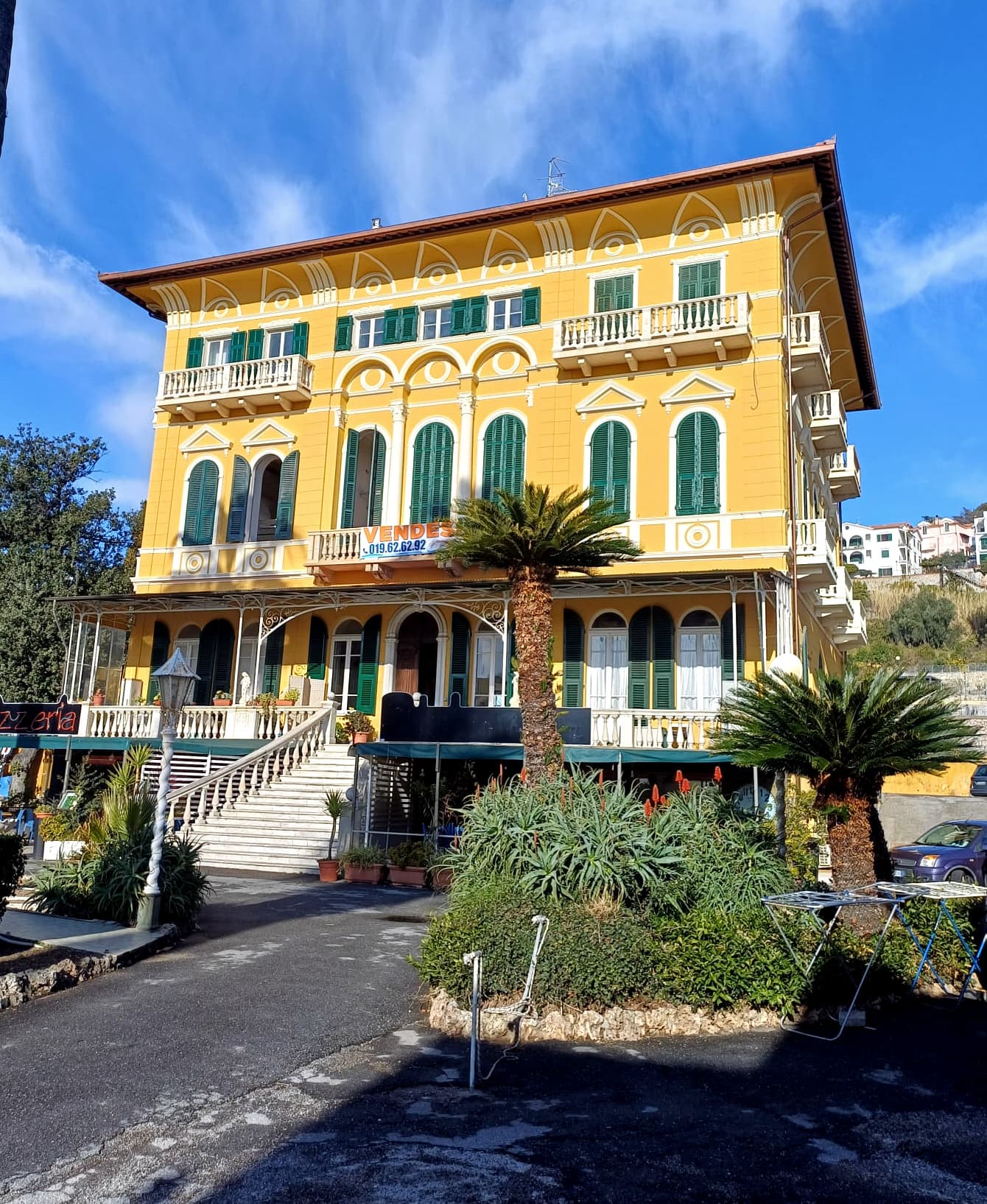 Villa Campo today — the yellow facade with green shutters, Pietra Ligure