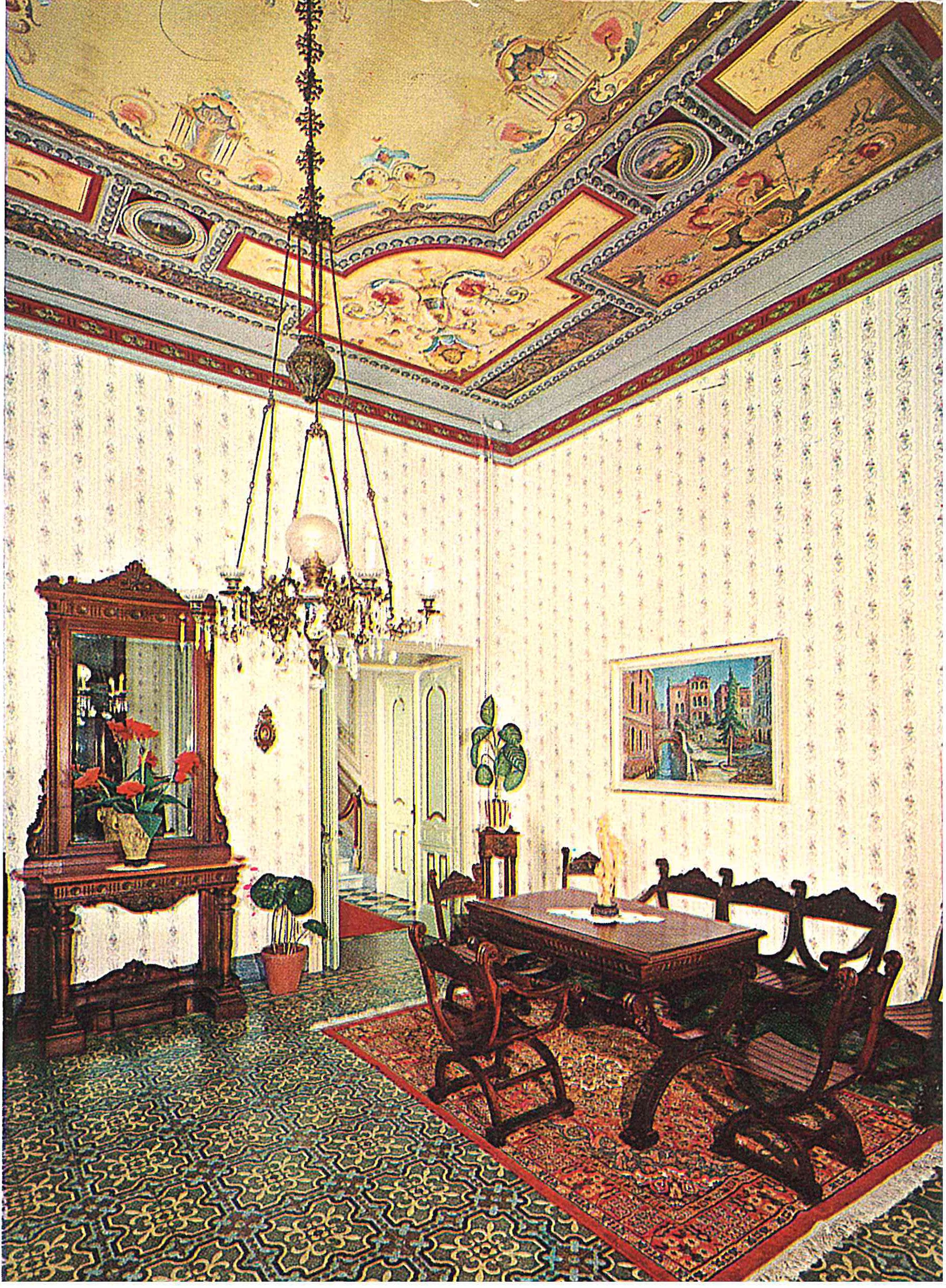 Historic interior with frescoed ceiling and antique furnishings